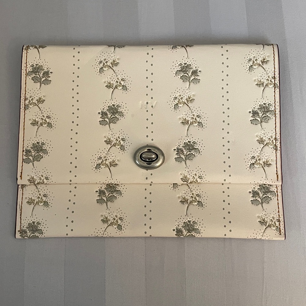 COACH Floral Cream Pouch with Silver Clasp with letters NV embossed